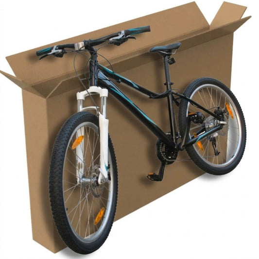 Bicycle inside a cardboard moving box on a white background
