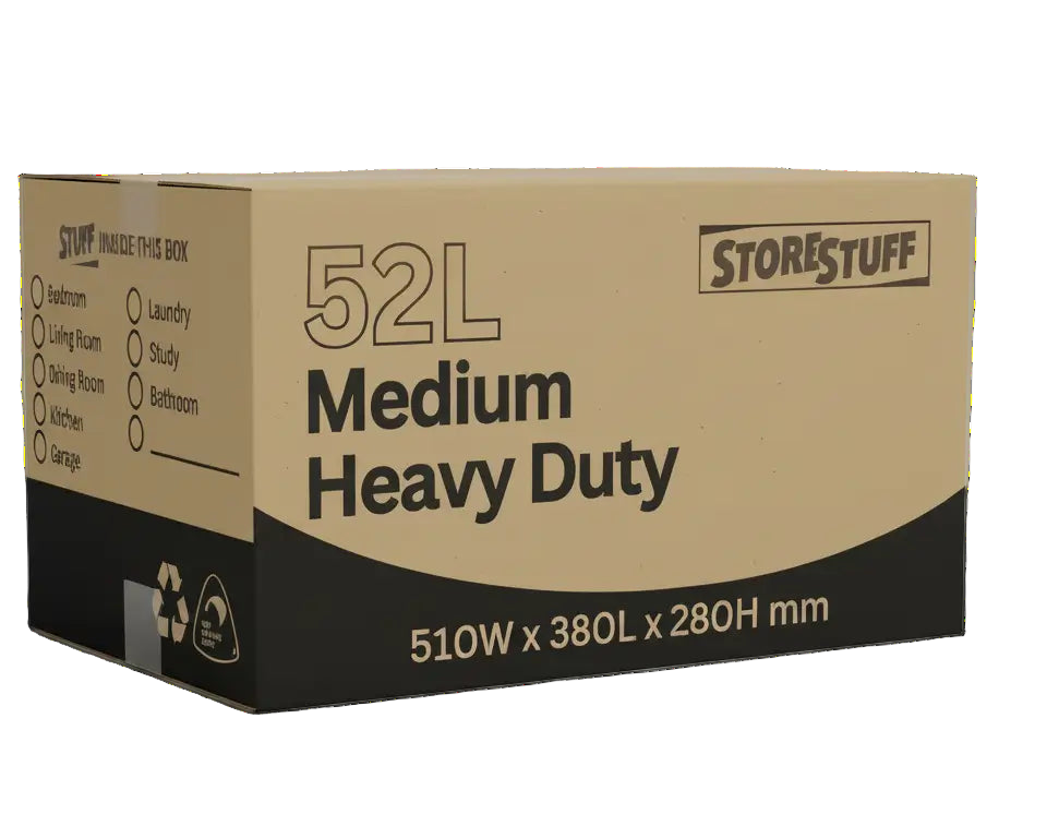 Cardboard box labeled '52L Medium Heavy Duty' by Store Stuff on a gray background